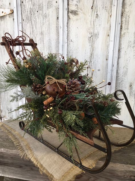 Vintage primitive sleigh arrangement from my #etsy shop: Vintage Sleigh with Rustic Bells and Candy Cane~Winter Pine Sleigh~Christmas Primitive Sleigh~Rustic Sleigh~Colonial Sleigh Sled Decorating Ideas Porch, Santa Sleigh Decorating Ideas, Large Sleigh Decorating Ideas, Sleigh Decorating Ideas Christmas, Santa Sleigh Decoration, Christmas Sleigh Centerpiece, Sleigh Decorations, Sleigh Decor, Muted Burgundy