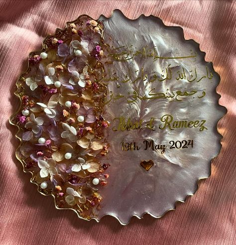 Lilac floral resin plaque for wedding. . Size: 8 inches. . Customisable. . #resinplaque #resincraft #resinartwork #resin #resinweddingplaque #weddinggiftideass Resin Plaque, Wedding Plaques, Gift Ide, Makeup Brushes Guide, Floral Resin, Resin Artwork, Cool Pictures Of Nature, May 21, Resin Crafts