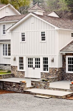 stone with board and batten Farmhouse Exterior Design, Farmhouse Architecture, Vertical Siding, Fresh Farmhouse, Modern Farmhouse Exterior, Exterior Ideas, Exterior Stone, Farmhouse Exterior, Horse Stables