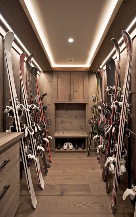 A sleek ski gear room featuring stylish racks for both skis and snowboards. Snowboard Storage Ideas, Ski Storage Ideas, Ski Gear Storage, Modern Setup, Snowboard Storage, Gear Room, Gear Storage, Ski Storage, Garage Storage Organization