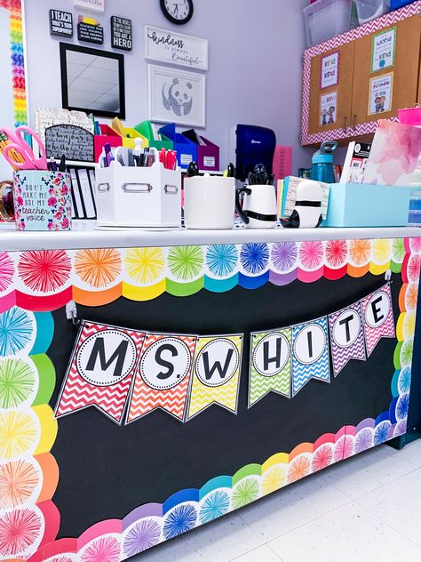 How To Decorate Teacher Desk, Teacher Desk Decorations Ideas, Bulletin Board Behind Teacher Desk, Bright Colored Classroom, Preschool Play Centers, Colorful Preschool Classroom Decor, Elementary Classroom Themes Colorful, Teacher Desk Decor Ideas, Primary Color Classroom Theme