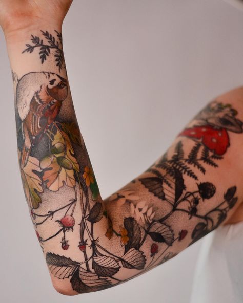 Polish tattoo artist Joanna Świrska (previously) stipples fur and inks subtle gradients to create fanciful scenarios of backpack-wearing kangaroos, cycling cats, and whimsical masses of tangled flora and fauna. Working as Dzo Lama, Świrska is known for her delicate illustrations that mix playful ele Tattoos Delicate, Maine Nature, Nature Sleeve, Polish Tattoos, Whimsical Tattoos, Forest Tattoos, Back Of Shoulder Tattoo, Theme Tattoo, Tatuaje A Color