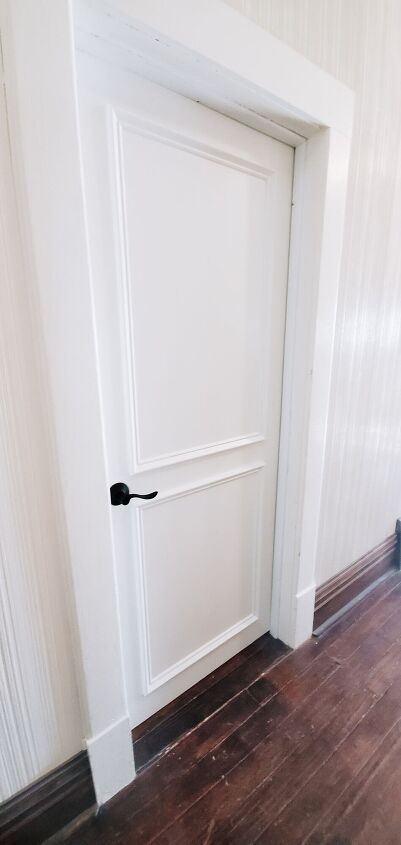 Trim On Interior Doors, Adding Detail To Plain Doors, Room Door Frame Design, Shoe Molding Around Door Frame, Wainscoting Door Frame, Picture Frame Molding Door, Add Moulding To Doors, White Molding Wood Doors, Framing A Door