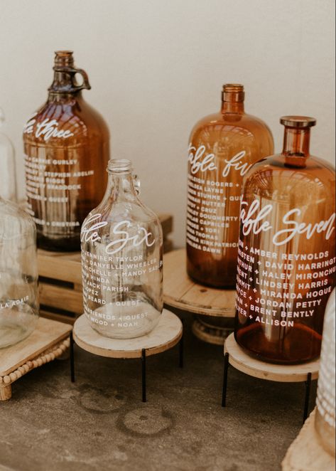 Moonshine Wedding Ideas, Western Seating Chart, Boho Seating Chart Wedding, Bottle Seating Chart, Boho Seating Chart, Old Liquor Bottles, Boho Seating, Taylor Wedding, Wedding October