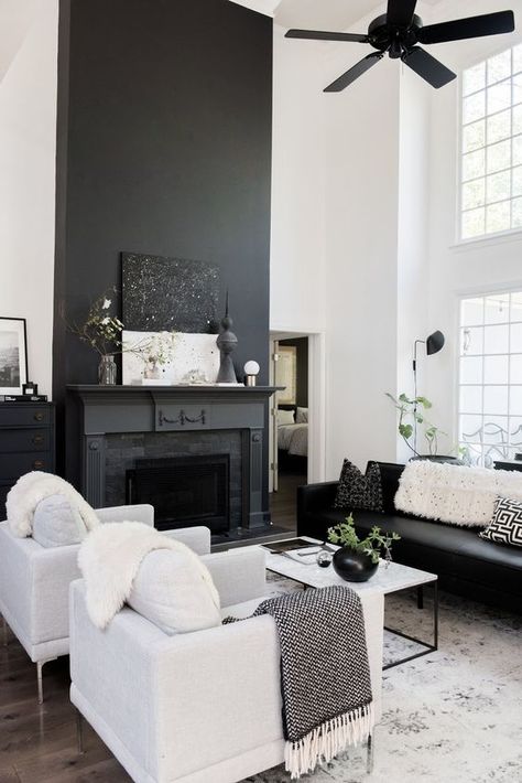 a Nordic living room with a black fireplace, black and white furniture, a black fan and a white coffee table Black And White Living Room Decor, Modern White Living Room, Georgia House, White Living Room Decor, Black And White Living Room, Nordic Living Room, White Living, White Living Room, Living Room White