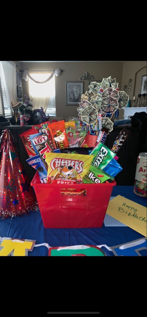 Candy Bucket Ideas Gift Baskets, Snack Bucket Gift, Candy Bucket Ideas, Gift Basket Snacks, Boy Gift Basket, Snack Bucket, Bucket Gifts, Bucket Ideas, Birthday Freebies