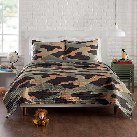 Redefine the look of your bed with this stylish quilt set from Urban Playground. Redefine the look of your bed with this stylish quilt set from Urban Playground. Bunk down with the cozy Covert Camo Quilt. This cool camo is a unique multi-colored version of a camouflage featuring an array of green, yellow, and gray. The printed face reverses to an army green solid. This easy care set is made of super soft brushed polyester.TWIN/TWIN XL 2-PIECE SET Quilt: 66'' x 88'' Sham: 20" x 26''FULL/QUEEN 3-P Camo Rooms, Camo Bedding, Army Bedroom, Camo Quilt, Playground Kids, Urban Playground, Cozy Cover, Twin Quilt Size, Rooms To Go