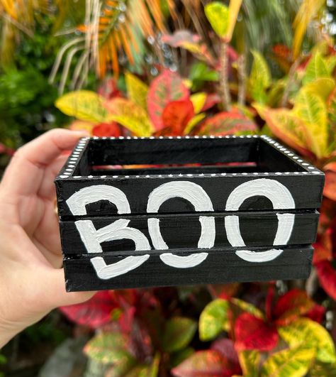 Hand painted "BOO" on a mini wooden crate box. Perfect for your Season Decor or as a Boo Box or for Tray Decor. Measures approx 5 1/2" X 3 1/4" X 2 1/2 Fall Wood Crate Decor, Wooden Crate Painting Ideas, Crate Crafts, Crate Decor, Wooden Crate Boxes, Painted Decor, Season Decor, Boo Basket, Pumpkin Ideas