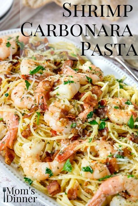 Whip up a delicious pasta dinner in just 25 minutes with this Shrimp Carbonara recipe. Enjoy perfectly cooked pasta enveloped in a rich, creamy sauce made from eggs and butter, complemented by succulent shrimp and crispy bacon. Shrimp Carbonara, Shrimp And Bacon, Creamy Seafood Pasta, Pasta A La Carbonara, Creamy Seafood, Pasta Carbonara Recipe, Shrimp Toast, Creamy Shrimp, Italian Pasta Dishes