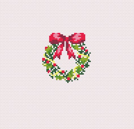 Small Christmas Wreath Cross Stitch PDF Pattern Perfect for anyone who loves Christmas or the holidays! Contains color names and DMC numbers Approximately 633 stitches to create Christmas Wreath Cross Stitch, Small Christmas Wreath, Wreath Cross Stitch, Holiday Cross Stitch Patterns, Cross Stitch Numbers, Wreath Cross, Cross Stitch Christmas Stockings, Tiny Cross Stitch, Holiday Cross Stitch