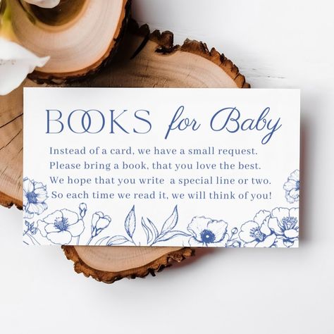 Introducing our delightful Dusty Blue Chinoiserie Books for Baby Enclosure Card, the perfect addition to any vintage floral-themed baby shower! 📚✨  📘 Imagine the joy of inviting your guests to contribute to baby's library with these charming enclosure cards, adorned with exquisite chinoiserie designs. Not just any ordinary cards, these are an elegant keepsake that perfectly complements your baby shower décor.  💙 Dive into the serenity of dusty blue hues, evoking a sense of calm and sophistication, ideal for a baby boy's celebration or gender-neutral gatherings. Each card whispers a tale of timeless tradition, reminiscent of vintage toile de jouy patterns, adding a touch of nostalgia to your special day.  🌸 Transform your event into a celebration of enduring beauty with these enchanting Vintage Blue Baby Shower Ideas, Small Baby Shower Ideas Boy, Classic Baby Boy Shower Ideas, Baby Boy In Bloom Shower Ideas, Baby Blue Baby Shower Ideas Boys, Spring Baby Shower Themes For Boys, Elegant Baby Shower Ideas For Boys, Spring Baby Shower Ideas For Boys, Dusty Blue Baby Shower Ideas