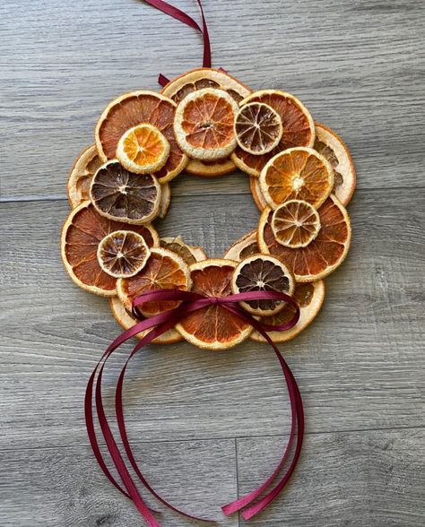 This natural citrus wreath is made with jewel-toned dried orange and grapefruit slices. Use these wreaths as window decor on their own and the will catch the light and give a beautiful glow, or pair them with an evergreen backdrop. Each wreath has natural variations and is made with biodegradable twine. to lengthen time of use, you can spray clear coat on both sides Yule Crafts, Farmhouse Cottagecore, Dried Wreath, Orange Wreath, Lemon Wreath, Dried Oranges, Autumn Decorating, Fall Halloween Crafts, Different Holidays