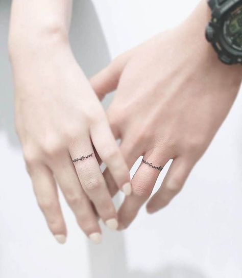 Always And Forever Ring Tattoo, Different Couple Tattoos, Tattoo Ring Ideas, Tattoo Rings For Couples, Wedding Ring Tattoo Ideas For Women, Couple Ring Tattoos, Marriage Tattoos Ring Finger, Wedding Band Tattoo Couples, Small Couples Tattoo