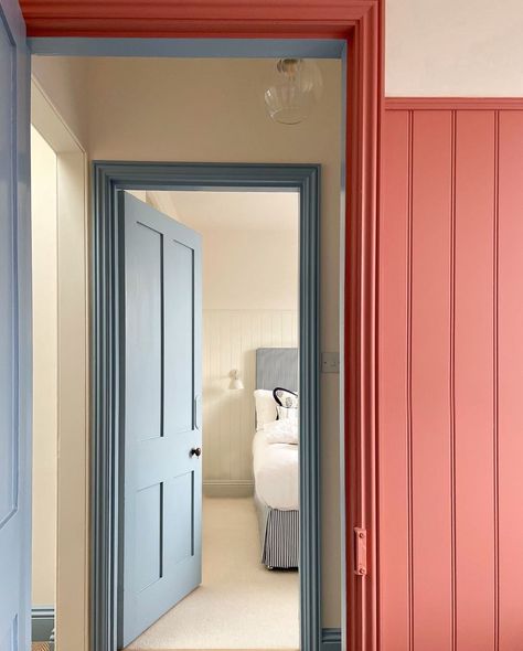 Blue Skirting Boards White Walls, Coloured Door Frames, Red Skirting Boards, Painted Door Trim, Hallway Door Colors, Painted Doorway, Geometric Pattern Interior, Painted Wardrobes, Hallway Wall Colors