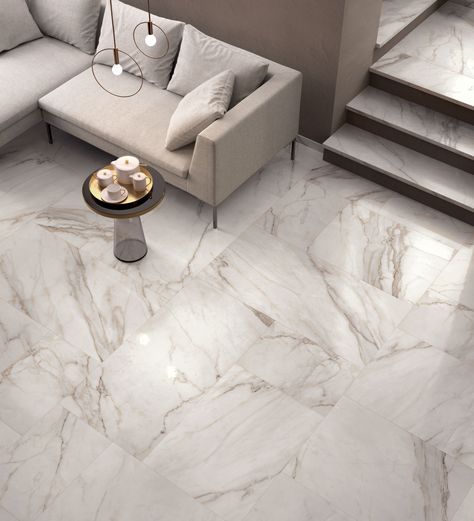 The LUXOR range is available in 3 finishes, each of which offers a unique characteristic to the 5 different types of marble on offer. the Matt finish offers the appearance of natural, untouched marble. The Honed finish gives the marble a timeworn effect to create a more rustic feeling. For a high-gloss finish which will add elegance and class to any space, choose the Polished finish. These broad selection of finishes, alongside the numerous sizes available, makes LUXOR ideal for architects. Marble Floor Living Room, Tiles Living Room, Tile Floor Living Room, Marble Floors, Living Room Tiles, Floor Tile Design, Marble Tile Floor, Granite Flooring, Marble Flooring