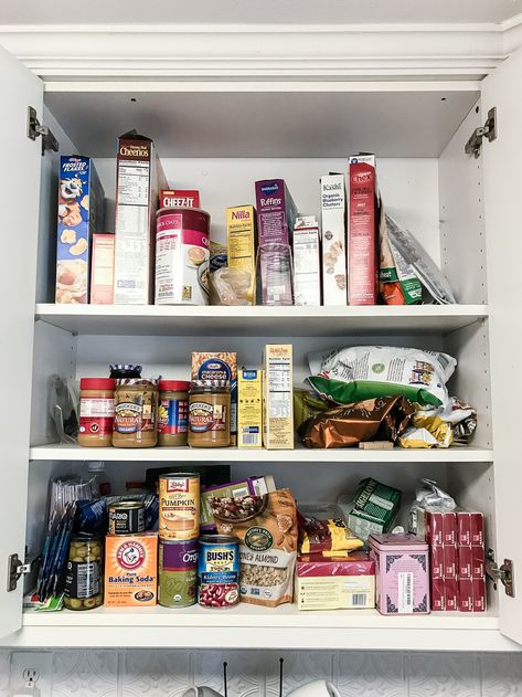 Pantry Cabinet Organization and Free Printable Label Set | blesserhouse.com - A cabinet gets a drastic organization makeover using inexpensive IKEA jars / baskets, hanging storage, and a free pantry label printable set. #organization Cabinet Food Organization, Food Cabinet Organization, Pantry Cabinet Organization, Ikea Jars, Pantry Labels Printable, Food Cabinet, Art Display Panels, Free Pantry Labels, Baking Storage