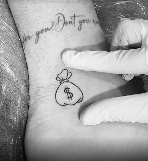 Cute Money Tattoo, Money Bag Finger Tattoo, Bag Of Money Tattoo, Money Heart Tattoo, Small Money Bag Tattoo, Money Tattoo Ideas For Women, Money Bag Tattoo Design, Time Is Money Tattoo, Money Tattoo Designs