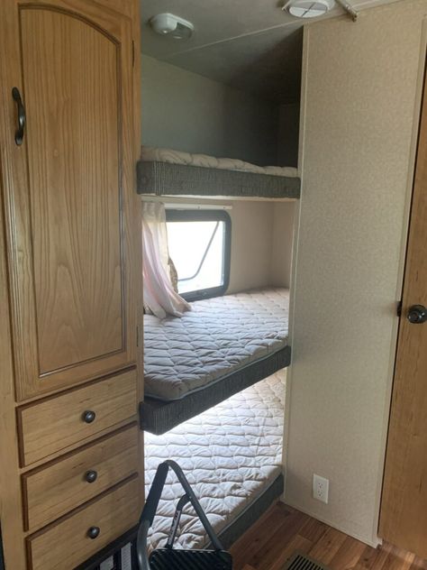 15 Renovation Ideas for an RV with Bunk Beds | RV Inspiration Rv Triple Bunk Beds Ideas, Rv Bunk Beds Remodel, Fold Up Bunk Beds Camper, Horse Trailer Bunk Bed Ideas, Camper Trailer Bunk Bed Ideas, Camper Bunk Curtains, Camper Bunk Remodel, Add Bunk Beds To Camper, Rv Bunk Bed Storage Ideas