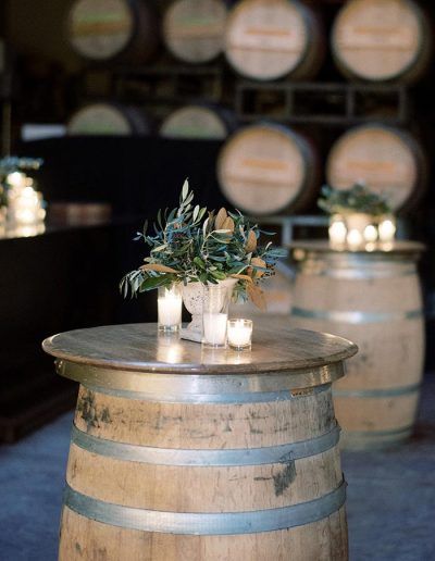 Wine Cellar Party Decorations, Winery Outdoor Space, Wine Cellar Wedding Reception, Wine Tasting Event Decor, Wine Dinner Decor, Wine Barrel Cocktail Table, Vineyard Dinner Party, Wine Barrel Wedding Decor, Wine Cellar Wedding