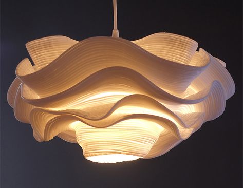 This unique pendant lamp may look like a fluffy cloud hanging down from the ceiling, but upon closer inspection is unexpectedly crafted from zippers. Abat-jour Diy, Design Objet, Ethereal Light, Unique Pendant Lights, Lampe Diy, Kitchen Lights, Metal Canopy, Lampe Design, Wooden Lamp