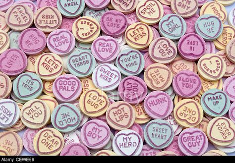 Large colourful pile of Love Heart candy sweets with cute captions; heart throb, sweet kiss, love bug, only you etc Stock Photo Love Heart Candy, Crush Signs, Heart Sweets, Candy Drawing, Love Heart Sweets, Kiss Me Love, Cute Captions, Heart Throb, Crush Love