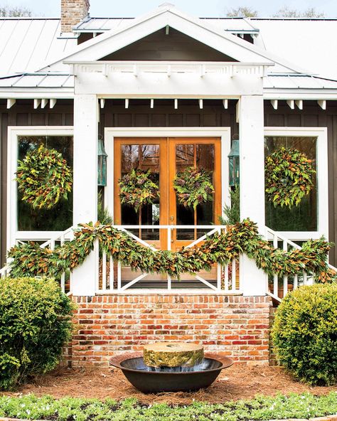 The Exterior James Farmer, Farmers Porch, Southern Living House Plans, Holiday Greenery, Country Christmas Decorations, Christmas Front Porch, Christmas Greenery, Outdoor Holidays, Outdoor Holiday Decor