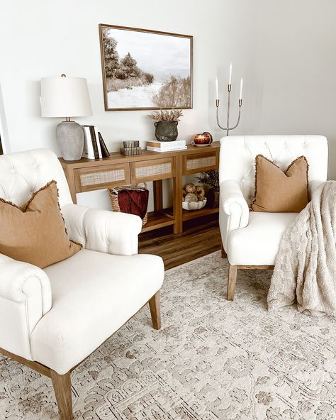 Before moving this dresser into our entryway hallway, I styled it in the front foyer. I loved the simplicity and serenity of the Neutral tones and natural textures create a calming entryway that invites warmth and peace from the moment you step inside. 🌟The first two pictures are what I styled before I decided to switch up the living room. The last three are what I ended up doing. 🤔What are your thoughts? Do you like the final result? Which one is your favorite? #HomeDecorInspo #Neutral... Subtle Disney Living Room, Entryway With Chair Ideas, Neutral Foyer Entryway, Entry Way Sitting Area Entrance, Foyer Living Room Combo, Entry Way Seating Area Entrance, Foyer Sitting Area Entryway, Two Accent Chairs In Living Room, Walk Into Living Room From Front Door