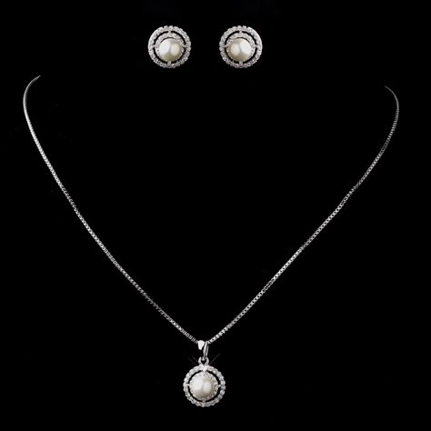 Wedding Pearl Necklace and Earring Jewelry Set, Bridal Pearl Jewelry Set Material : Cubic Zirconia. Plating : Platinum. Pendant Shape : Round. Suitable for : Female. Style : Fashion. Usage : Decoration. Usage : Decoration, Wedding and Party. Color : Silver. Length : 45cm. Elegant Jewelry , wedding jewelry , bridal jewelry Cubic zirconia versus diamond: There are a few key features of cubic zirconia which distinguish it from diamond: One face of an uncut oc Bridal Pearl Jewelry, Wedding Pearl Necklace, Simple Silver Jewelry, German Silver Jewelry, Pearl Bridal Jewelry, Pearl Necklace Wedding, Bridal Jewelry Set, Dry Creek, Custom Jewelry Ideas