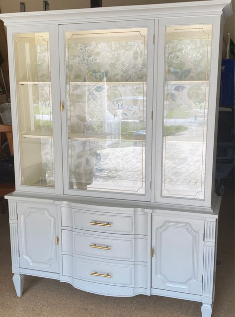 Blush Hutch, White And Gold China Cabinet, Vintage China Cabinet Decor, White China Cabinet Makeover, Painting China Cabinet Ideas, China Cabinet Redo Before And After, Wallpaper China Cabinet, Redone China Cabinet, Refinished Hutch Ideas