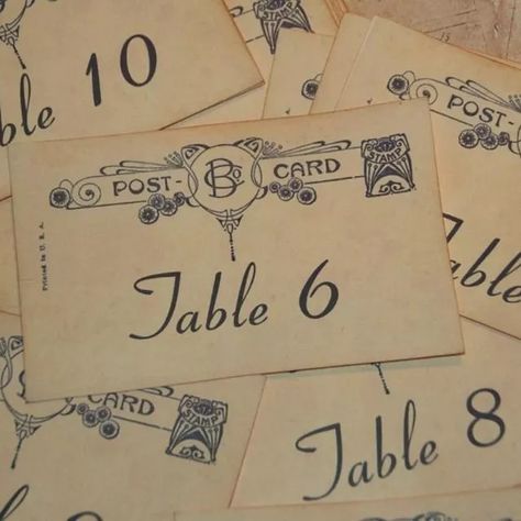 Wedding Table Number Clips, Vintage Postcard Table Numbers, Table Numbers Wedding Vintage, Table Numbering Ideas For Weddings, Vintage Table Number Ideas, Vintage Wedding Table Numbers, Vintage Table Numbers Wedding, Classy Table Numbers, Vintage Wedding Signage