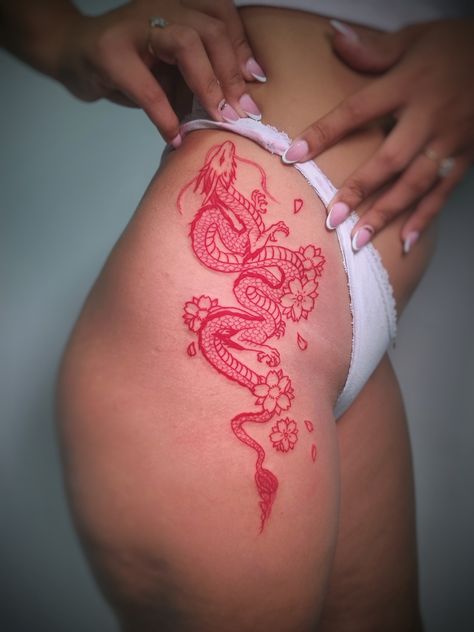 Red dragon tattoo #redprojecttattoo #reddragon #redtattoo Red Dragon Thigh Tattoo, Girly Dragon Tattoo, Red Thigh Tattoo, Red Dragon Tattoo For Women, Dragon Tattoos Women, Red Dragon Back Tattoo, Red Dragon Drawing, Monet Tattoo, Dragon Thigh Tattoo