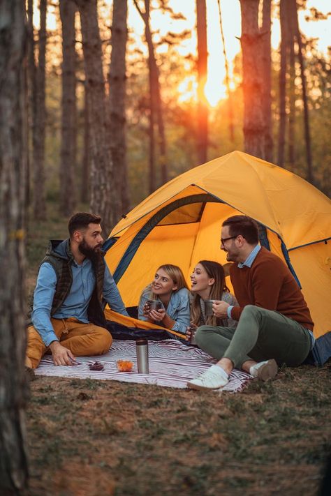 Four young friends sitting outside their tent drinking hot beverages and socializing, look at the happiness of their face | camping photography Friends Sitting Together, Camping Photoshoot, Photoshoot Friends, Sitting Together, Sitting Outside, Camping Photography, Hot Beverages, Friend Photoshoot, Styled Shoot