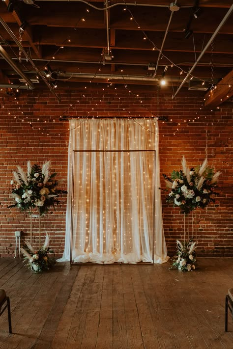 Wedding Backdrop Brick Wall, How To Hide Walls For A Wedding, Brick Wall Ceremony Backdrop, Eloped Pictures, Photowall Ideas Wedding, Wedding Photo Station Backdrop, Navy Blue Dusty Rose Wedding, Wedding Altar Ideas Indoor, Wedding Picture Wall