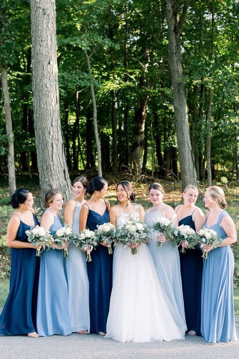 Bride with her Bridemaids dressed in different shades of blue Bride And Blue Bridesmaids, Saphire Dresses Bridesmaid, Blue Themed Wedding Dress, Blue Wedding Theme Indian, Brides Made Dresses Blue, Blue Dresses For Bridesmaid, Blue Shades Wedding Theme, Bestmaids Dresses, Bridemades Dresses Blue