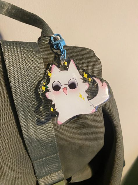 "Cat Gojo! The strongest Jujutsu Sorcerer, now in a keychain that can go anywhere with you ★Perfect for Backpacks, handbags or wherever you require Gojo to be :) ★Keychains are 2.5\"/2.5\" (not including clasp) ★Gojo comes with a blue metal easy open clasp on the top ★Any questions send me a message! :)" Anime Keychains Aesthetic, Anime Keychains Acrylic, Gift Giving Aesthetic, Jjk Keychain, Gojo Keychain, Cute Cat Anime, Gojo Cat, Keychain Art, Jujutsu Sorcerer