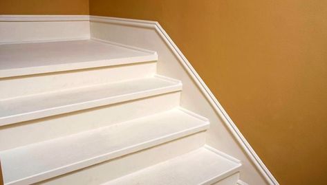 Create the look of custom trimwork with this simple faux baseboard project. Stairway Trim, Tiny Stairs, Stair Skirt, Stairs Skirting, Stairs Trim, Molding Ideas, Stair Makeover, Stair Rail, Entry Stairs