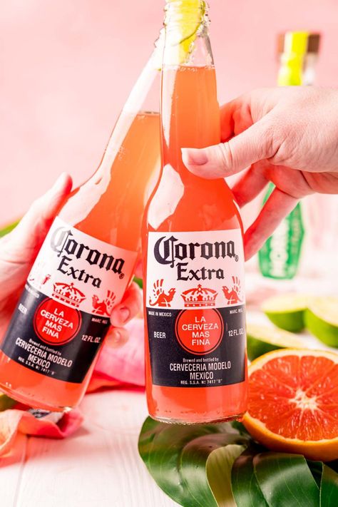 This Corona Sunrise Cocktail is a fun and easy drink recipe made right in the bottle with beer, tequila, orange juice, grenadine, and lime juice and is perfect for summer! Beer Drinks Recipes, Corona Beer Cocktails, Sunrise Drink, Beer Cocktail Recipes, Sunrise Cocktail, Orange Drink, Beer Drinks, Fun Summer Drinks, Beer Cocktail