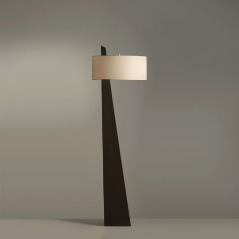 Striking lighting. This floor lamp’s sharply tapered pyramid silhouette brings a bold + angular accent to your space. A beige linen drum shade filters the light and layers in contrasting softness, but it’s set asymmetrically on the body for a final unexpected element. PRODUCT NOTES D 45cm x H 162cm / ∅ 17.7″ x H 63.8″. (59" plug cord) Black, Beige. SKU: RDF-190409 MATERIALS Iron body, fabric lampshade. E26 or E27 socket. (Not included bulbs) PRODUCT SHEET Abstract Lamps, Luxury Floor Lamp, Contemporary Floor Lamp, Iron Body, Contemporary Floor Lamps, Fabric Lampshade, Black Floor Lamp, Living Room Flooring, Coimbatore