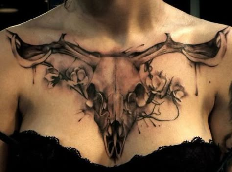 That deer got the ultimate placement. #InkedMagazine #tattoo #skull #inked #art #tattoos #chestpiece Animal Skull Tattoo, Longhorn Tattoo, Cow Skull Tattoos, Deer Skull Tattoos, Bull Skull Tattoos, Skull Tattoo Designs, Ram Tattoo, Bull Tattoos, Tattoo Animal