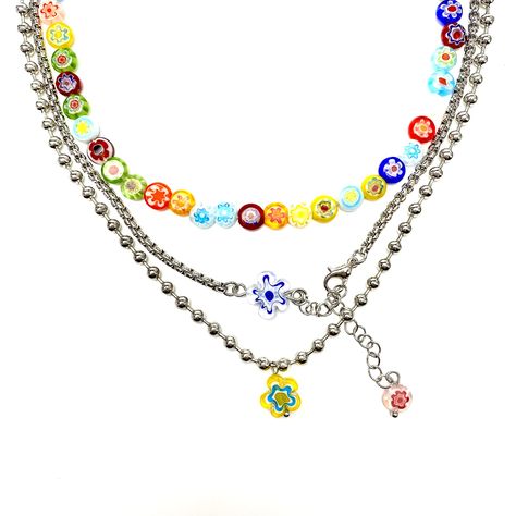 PRICES MAY VARY. 【Size】This item include three separate necklaces: Beaded Choker 13”+4”; Flower Necklace 16”; Flower & Bead Necklace 15”+2” 【Material】14K white gold plated stainless steel chains. Beads and flower pendant are made of colored glaze. High quality, safe to skin, will not fade and not easy to be broken. 【Design】This layered y2k trendy necklace has 3 tier. Includes 1 rainbow beaded choker and 2 dainty flower necklaces. They are designed to be worn together, but you can also choose to Surfergirl Style, Colorful Beaded Necklace, Y2k Necklace, Y2k Accessories, Indie Jewelry, Necklace Bead, Necklace Layered, Bead Choker, Gold Necklace Women