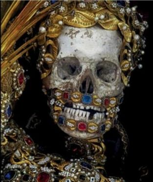 An art historian hailed as ‘Indiana Bones’ has cast light on centuries-old jewel-encrusted skeletons held in churches across Europe in his book ‘Heavenly Bodies: Cult Treasures and Spectacular Saints from the Catacombs’. - See more at: http://www.italymagazine.com/news/heavenly-bodies-book-examines-skeletons-roman-catacombs#sthash.NlLzOiOz.dpuf Rome Catacombs, Stage Management, Relic Hunter, Santi Cattolici, The Catacombs, San Francesco, A Skeleton, A Skull, Art Historian