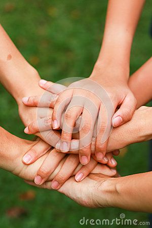 A group of people holding hands to show their unity and togetherness Unity Photography, Hand Fotografie, Hands Making A Heart, People Holding Hands, Hand Photography, Human Body Parts, A Group Of People, Hand Images, Creative Photography Techniques