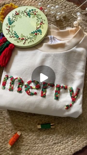 Ujjwala • Canvas Embroidery Art on Instagram: "Let’s embroider a Christmas sweater together! 🎄 Merry Christmas everyone! 🧑🏻‍🎄❤️ #christmasdecor #christmassweater #christmasclothes #christmashoodie #embroideryart #embroidered #embroideredflowers #embroideredsweatshirt #embroiderylettering #merrychristmas #embroideryindia #embroideryartist #exploremore #christmasvibes" Christmas Sweater Embroidery Ideas, Hand Embroidery Shirt Design, Mens Embroidery Designs, Christmas Hand Embroidery Sweatshirts, Embroidery Christmas Sweater, Shirt Embroidery Ideas Simple, Christmas Embroidery Sweater, Diy Christmas Sweatshirts, Hand Embroidered Christmas Shirt