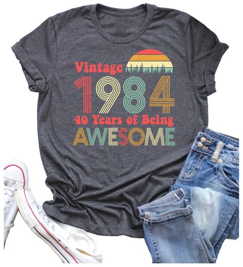 PRICES MAY VARY. 40 Years T-shirts Material: Cotton Blend, Durable, Breathable ,Skin-friendly, SUPER SOFT and COMFORTABLE to Wear. Bust: S(37.01'') M(38.58'') L(40.94'') XL(42.52'') XXL(44.00''). Funny 40th Birthday Gifts : Vintage 1984 Original Parts Shirts for Women, Short Sleeve Crew Neck Loose Casual T Shirt Party Tees ,1984 40th Birthday Retro Color Tops Features a Retro 80's Color Scheme, Distressed font and Simple Cool Design Make This Awesome Funny Birthday Shirt. Occasion: Perfect For 4 1984 Shirt, 40th Birthday For Women, Funny Birthday Shirts, 40th Birthday Funny, 40th Birthday Shirts, 40th Birthday Gifts, Drinking Shirts, Party Tops, Shirt For Women