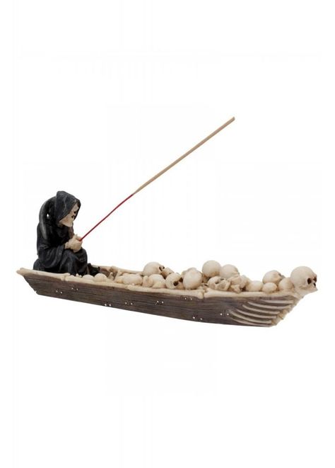 Sale away with the Ferryman Incense Holder from Nemesis Now. This gothic decorative accessory features a reaper with his skulls and a space for you favourite incense stick.    Resin   Reaper and skulls design   Incense sticks not included   Approx. 25cm long The Ferryman, Gothic Homeware, Skulls Design, Industrial Art Deco, Gothic Interior, Incense Oil, Alternative Gifts, Attitude Clothing, Gothic Gifts