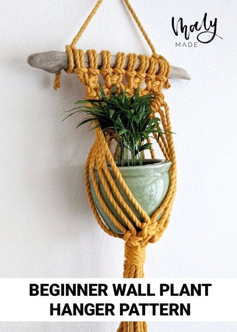 The image contains a plant hanger made with mustard-colored rope mounted onto a piece of driftwood. The rope has been knotted to form a small pouch for a plant and pot. The text on the bottom of the image reads "Beginner Wall Plant Hanger Pattern". Crochet Hanging Plants, Crochet Plant Holder, Diy Macrame Plant Hanger Pattern, Plant Hanger Pattern, Driftwood Macrame, Crochet Plant Hanger, Hanging Crochet, Wall Plant Hanger, Crochet Hanging