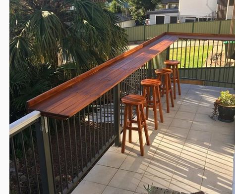 Make the most of your balcony with a railing bar - ideacious Deck With Bar Railing, Deck With Bar Counter, Deck Rail Bar, Railing Bar, Railing Table, Porch Bar, Deck Bar, Patio Railing, Diy Balcony