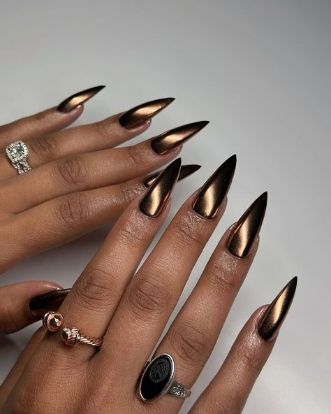 Dark femme 🌚 @apresnailofficial sculpted long stiletto @daily_charme black gel polish @the_gelbottle_inc bronze chrome #gelx… | Instagram Black Chrome Nails, Wife Nails, Bronze Nails, Chrome Nails Designs, Shiny Nails, Pretty Gel Nails, Mob Wife, Chic Nails, Dope Nails