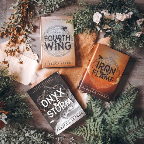 What do we think of the Onyx Storm cover? I really like it but it's not at all what I was expecting! I thought maybe the books would be in a gradient from gold to black, so I thought this book would be a dark copper color! But I guess with a title like Onyx Storm it makes sense being black. #bookstagram #readersofig #fourthwing #onyxstorm #ironflame Rainbow Bookshelf, Balto And Jenna, Empyrean Series, Book Fandoms Unite, Divine Rivals, Book Mood, Iron Flame, Book Cart, John Waters