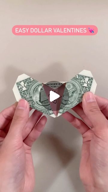 Valentina Balance on Instagram: "How to fold money heart lockets; what would you put inside? #valentines 💘" How To Make Heart With Money, How To Fold A Paper Heart, Money Heart Tutorial, How To Fold A Dollar Into A Heart, How To Fold Money Into A Heart, Heart Dollar, Money Star, Money Heart, Money Folding